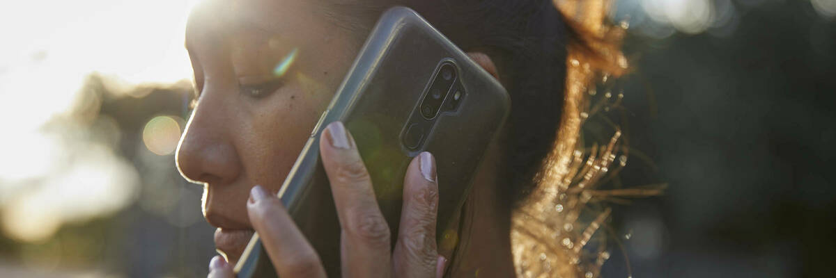 Image of a woman on the phone