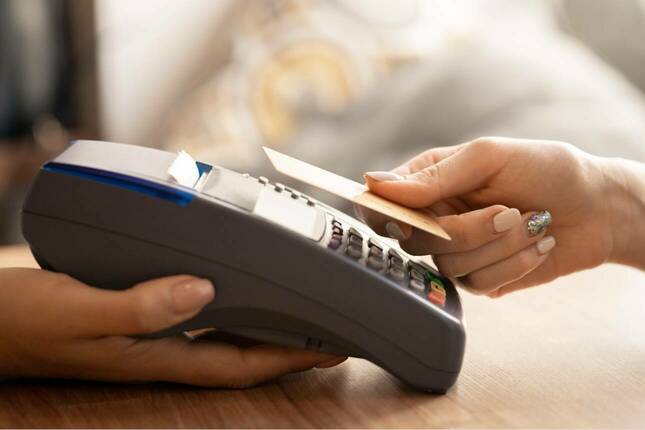 Woman using Paywave.