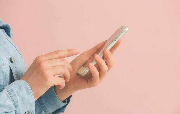 Person holding phone.