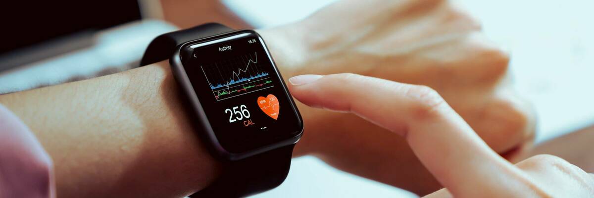 Image of a woman wearing a fitness tracker