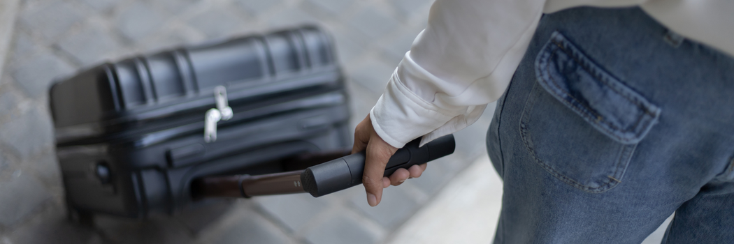Image of a woman with a suitcase