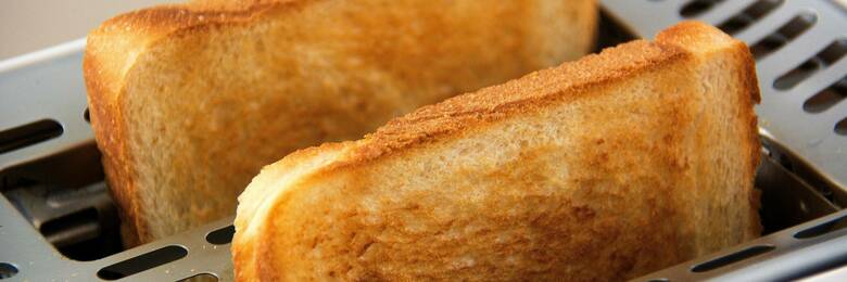 Image of bread popping out of a toaster