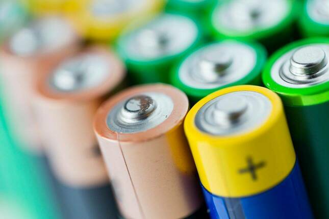 Row of AA batteries.